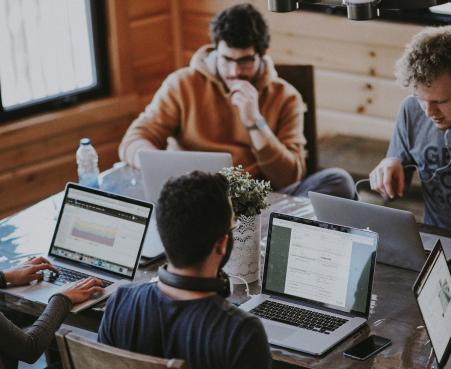 employees working around table
